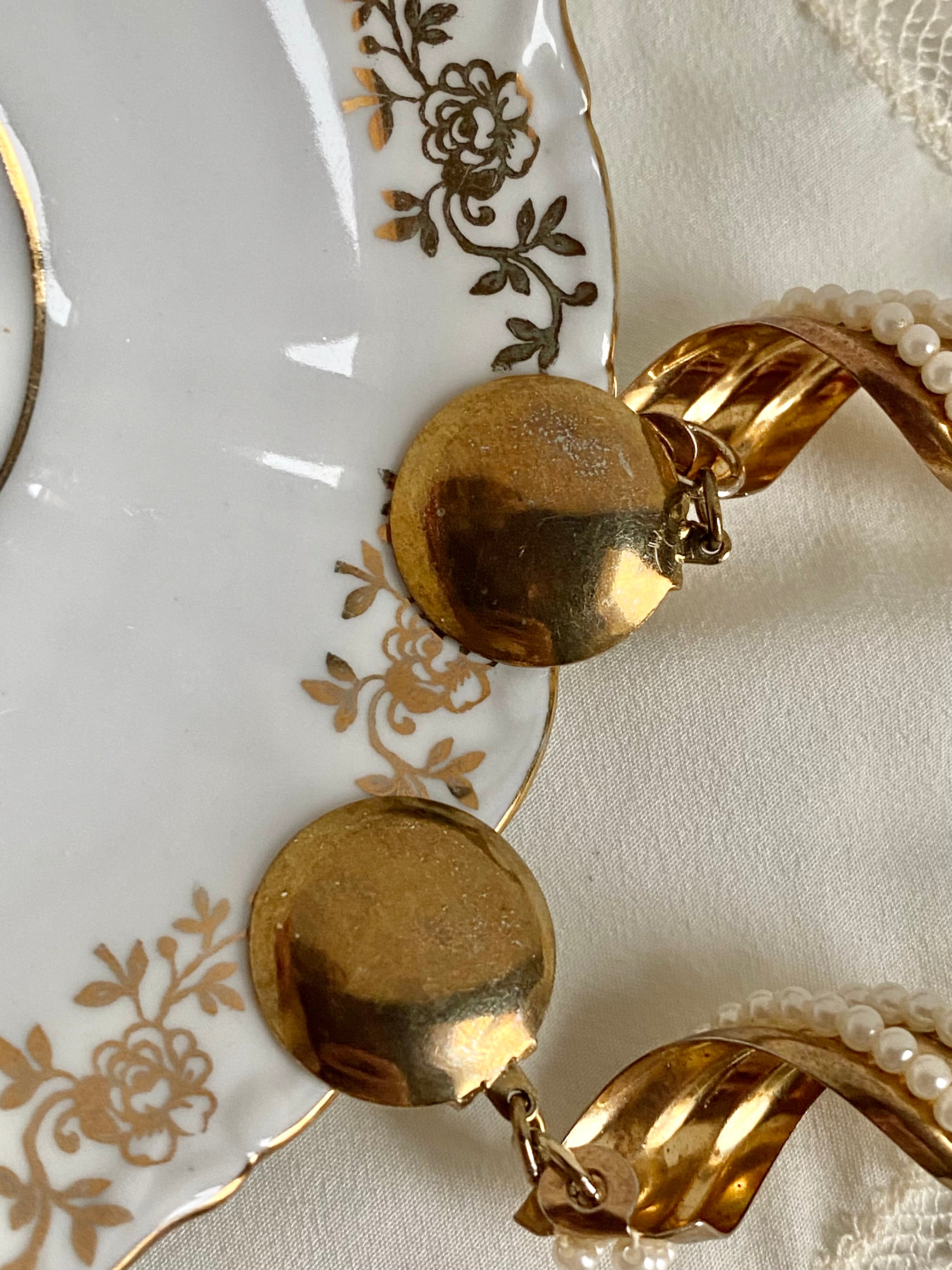 Onda orecchini a clip