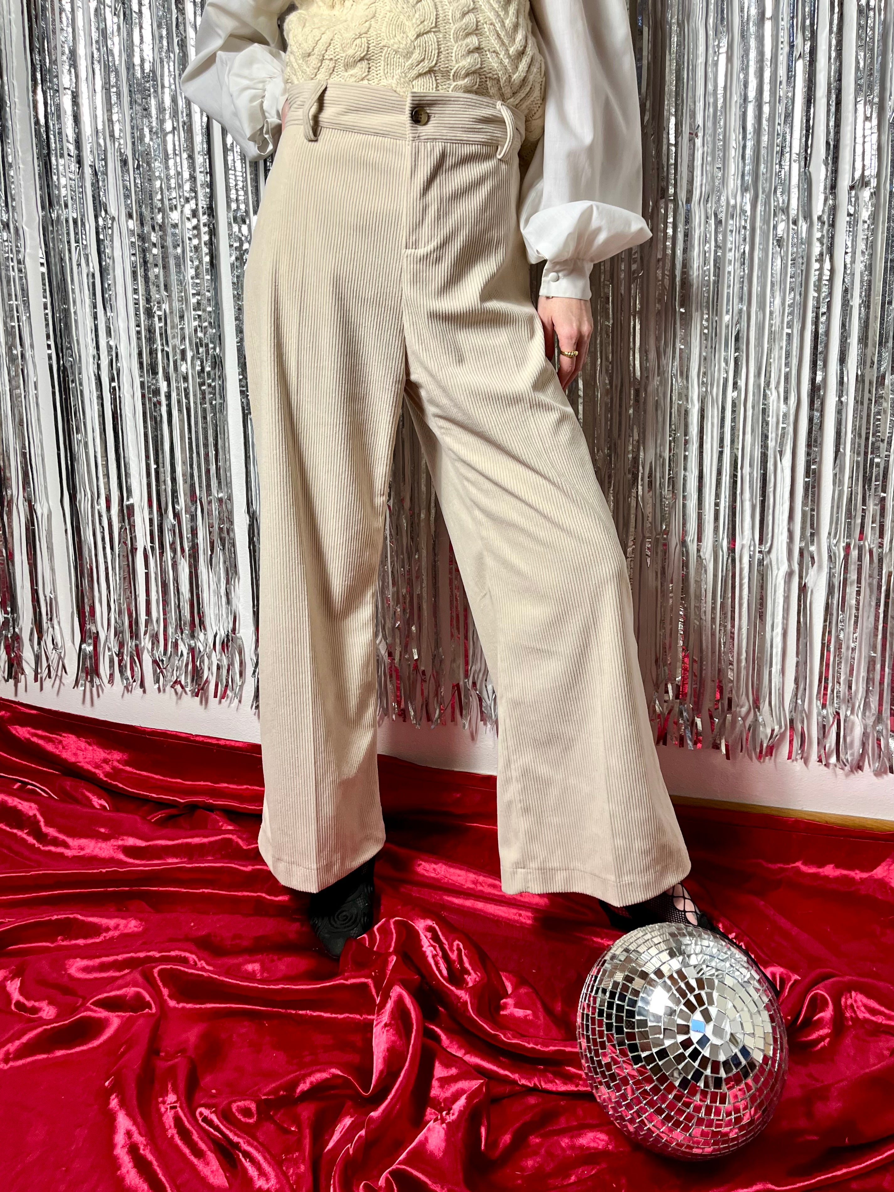 Pantaloni in velluto a coste crema