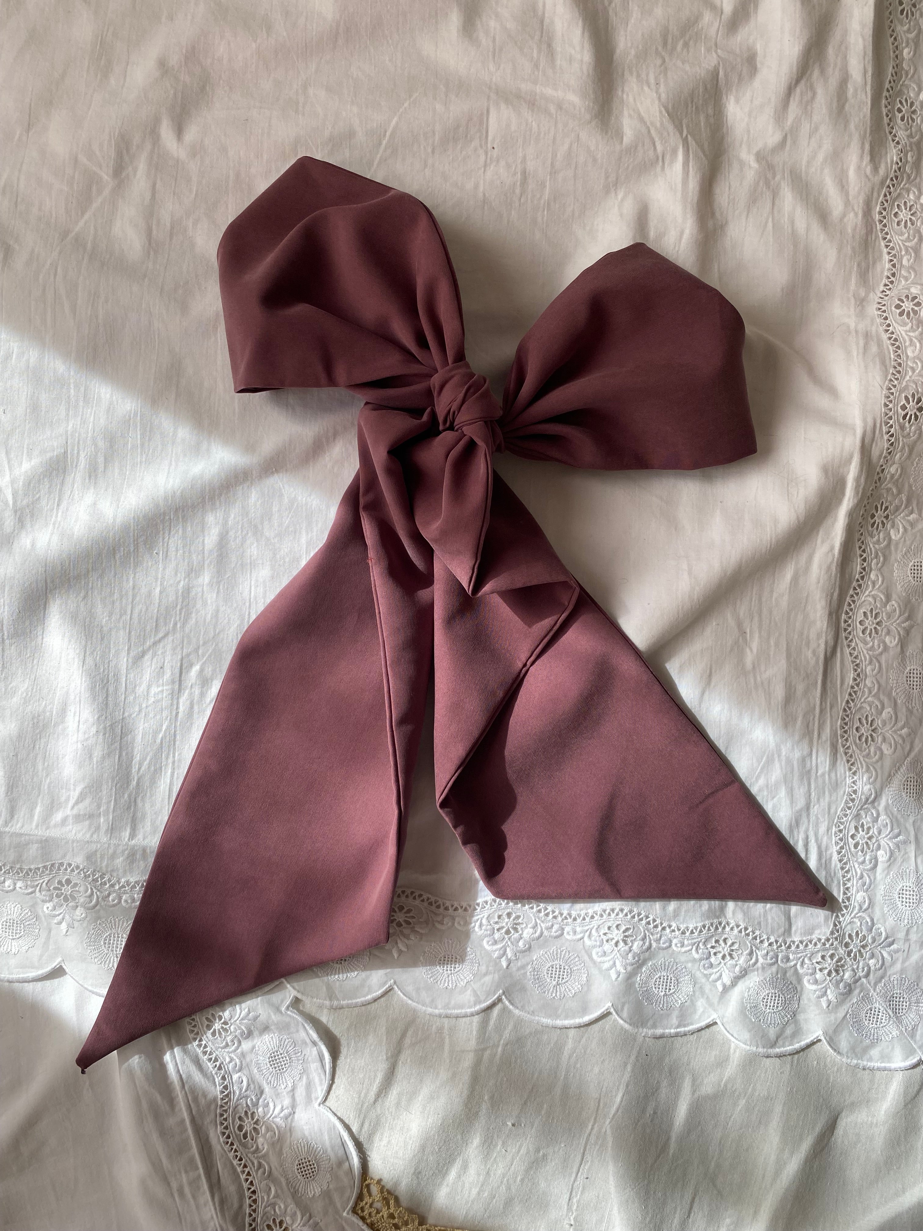 Fiocco sartoriale viola