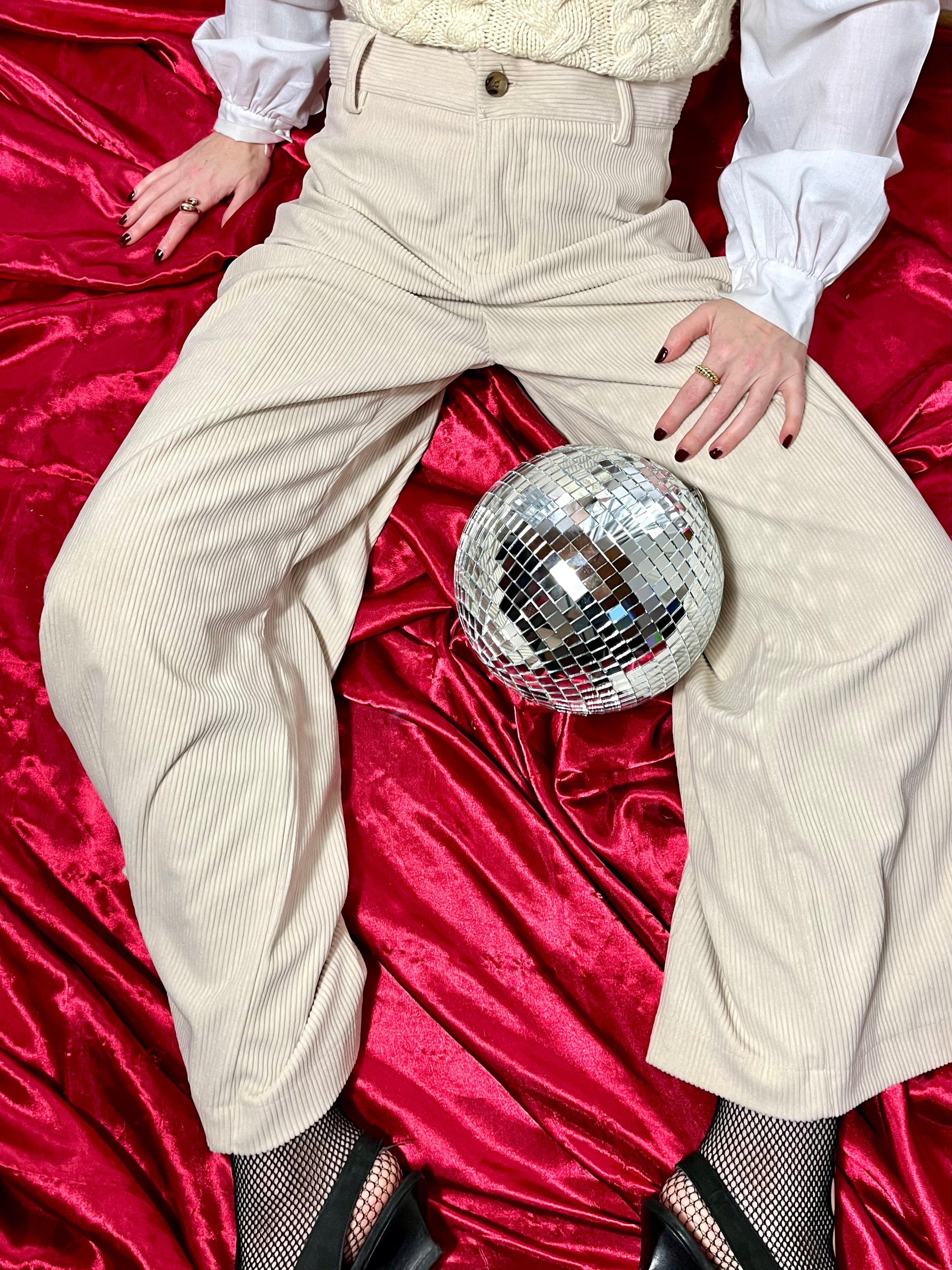 Pantaloni in velluto a coste crema