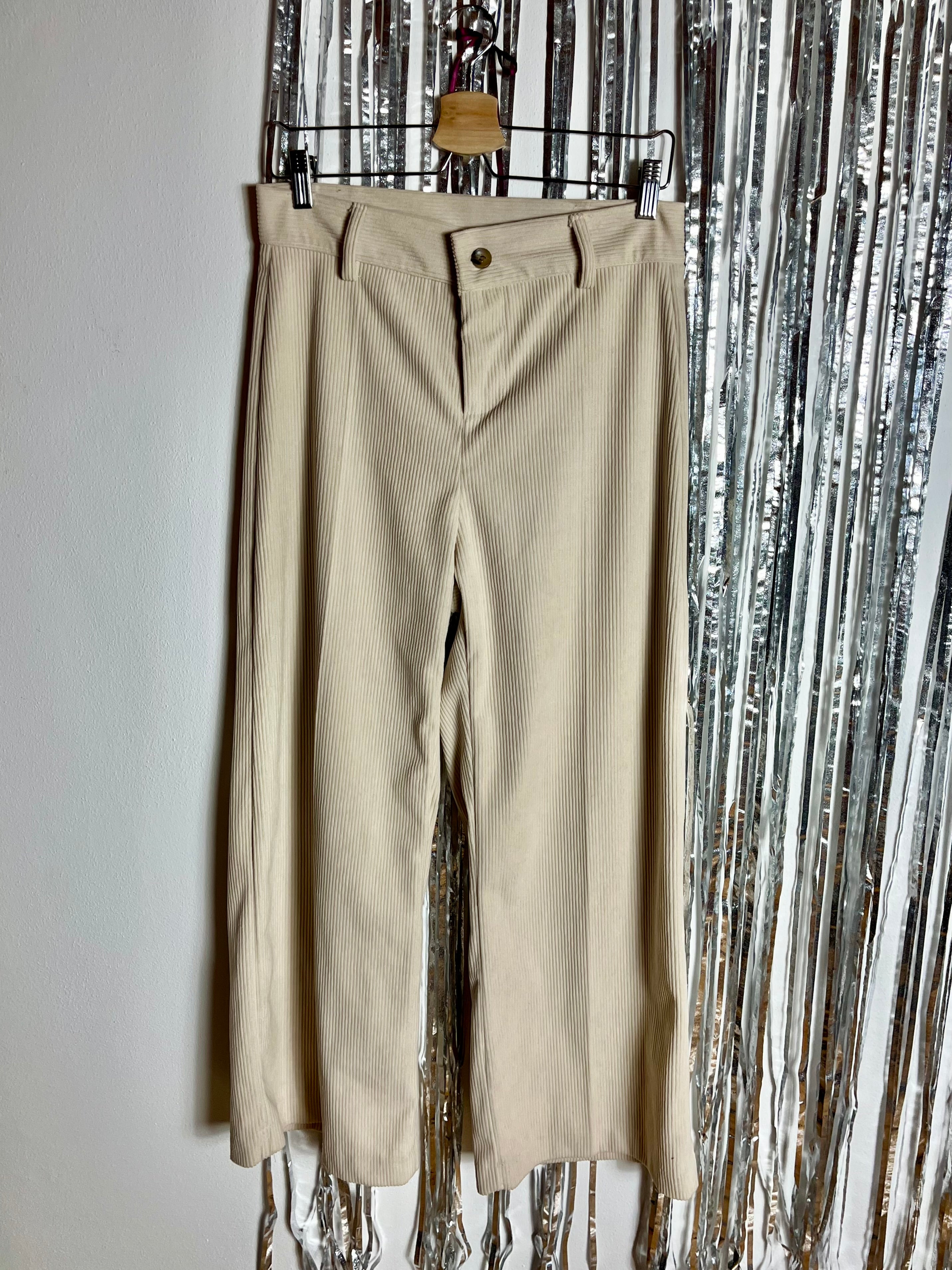 Pantaloni in velluto a coste crema