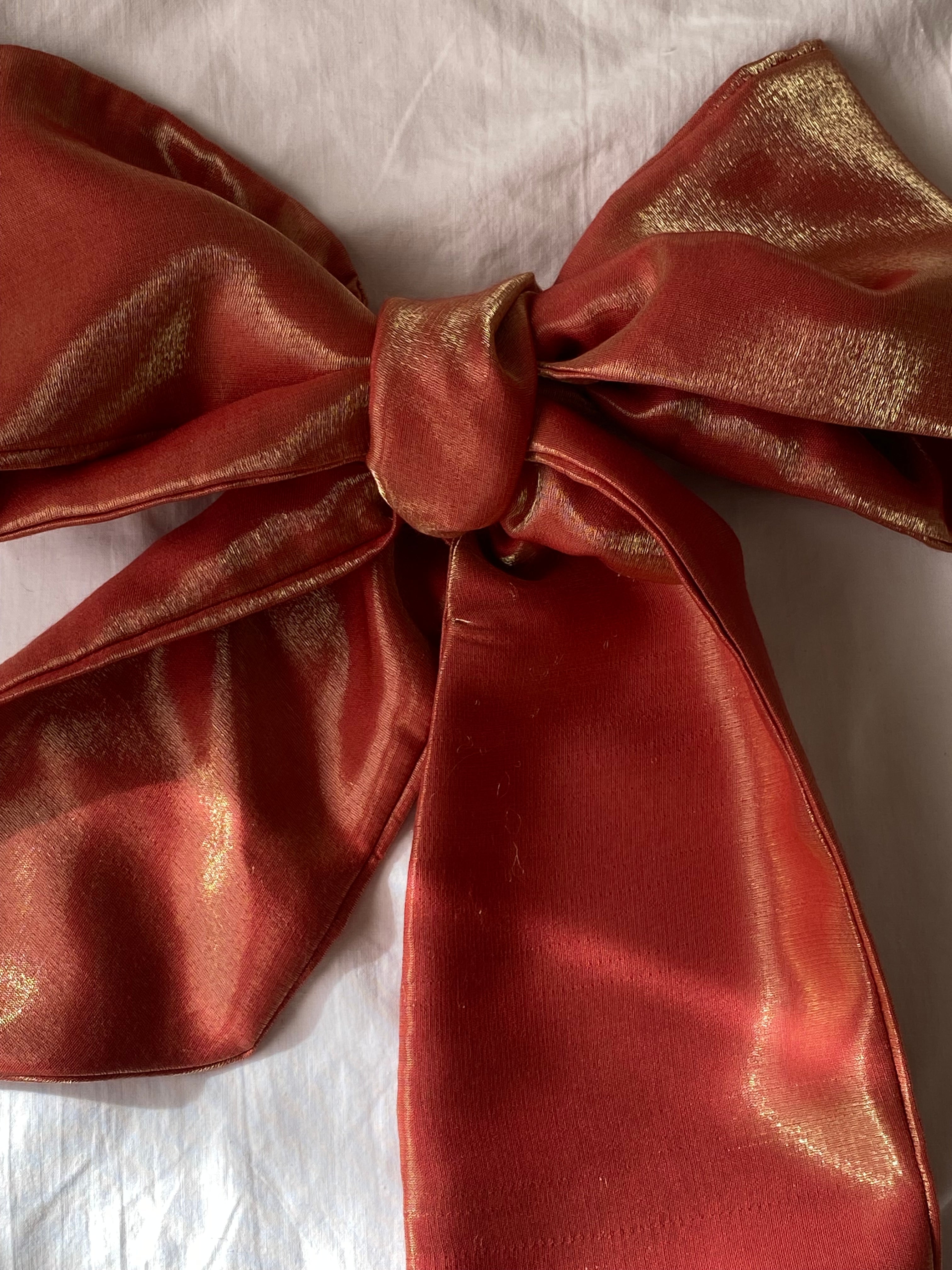 Fiocco sartoriale corallo