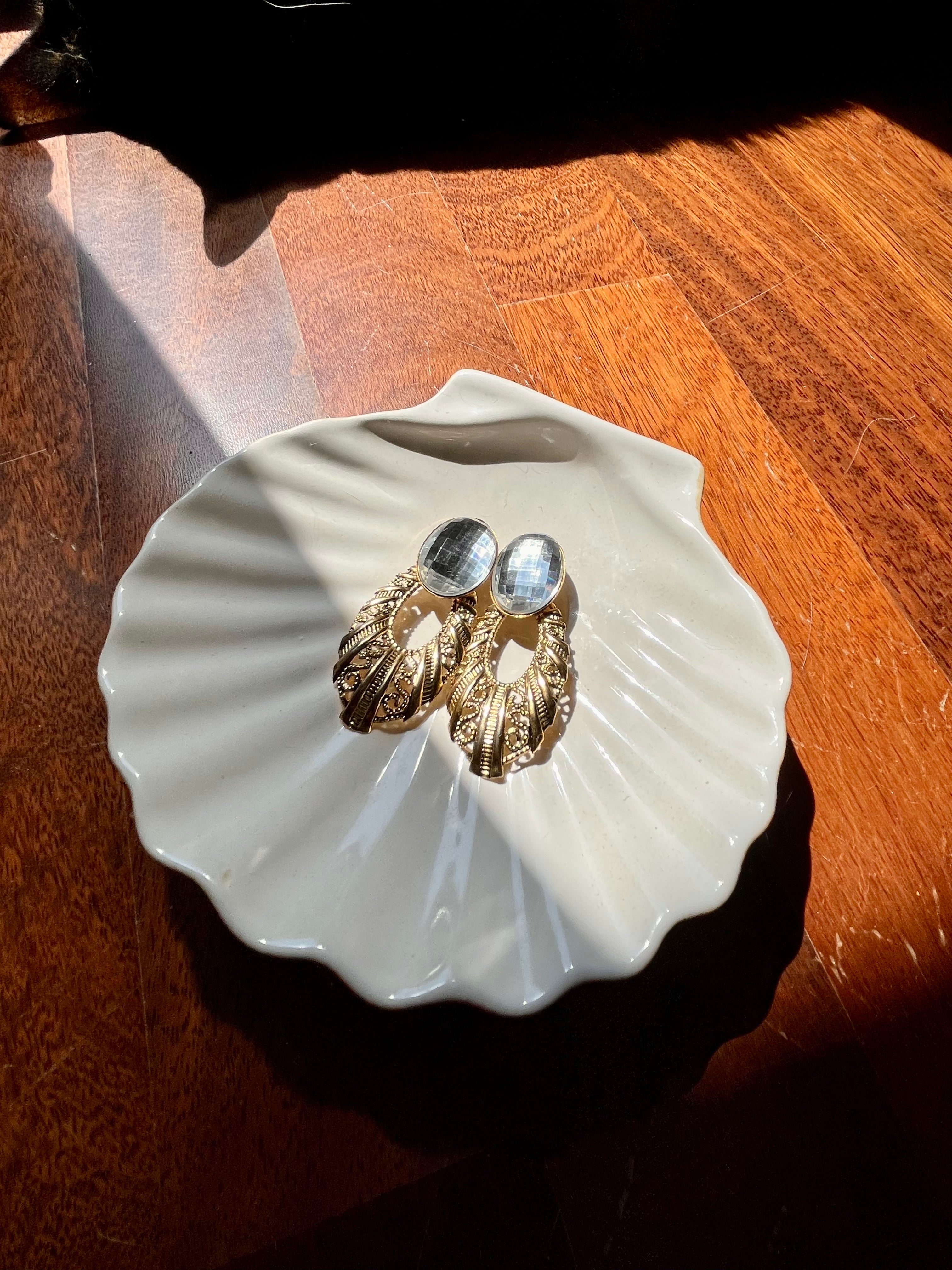 Venere orecchini a clip con punto luce