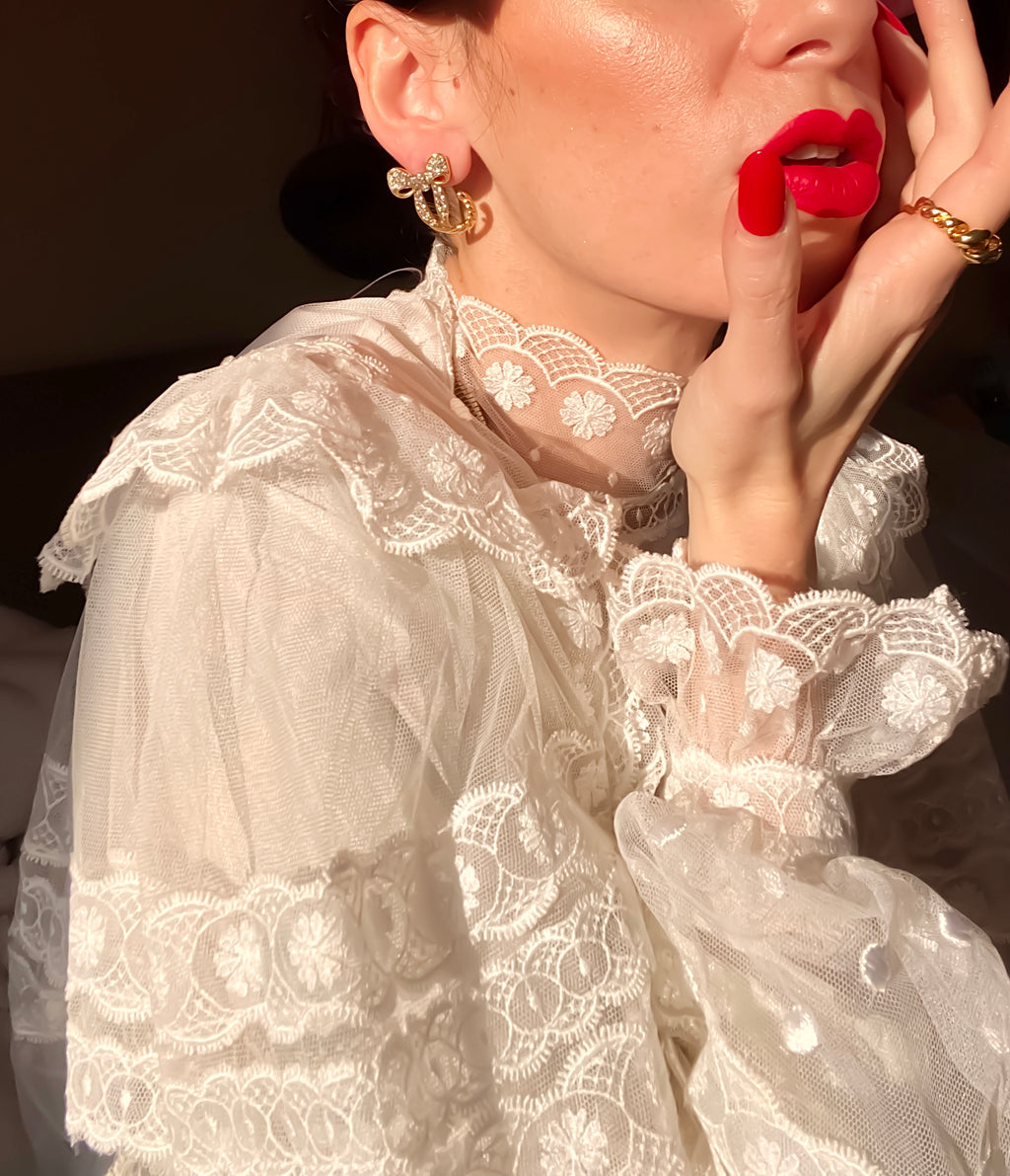 Boucles d'oreilles nœud avec strass