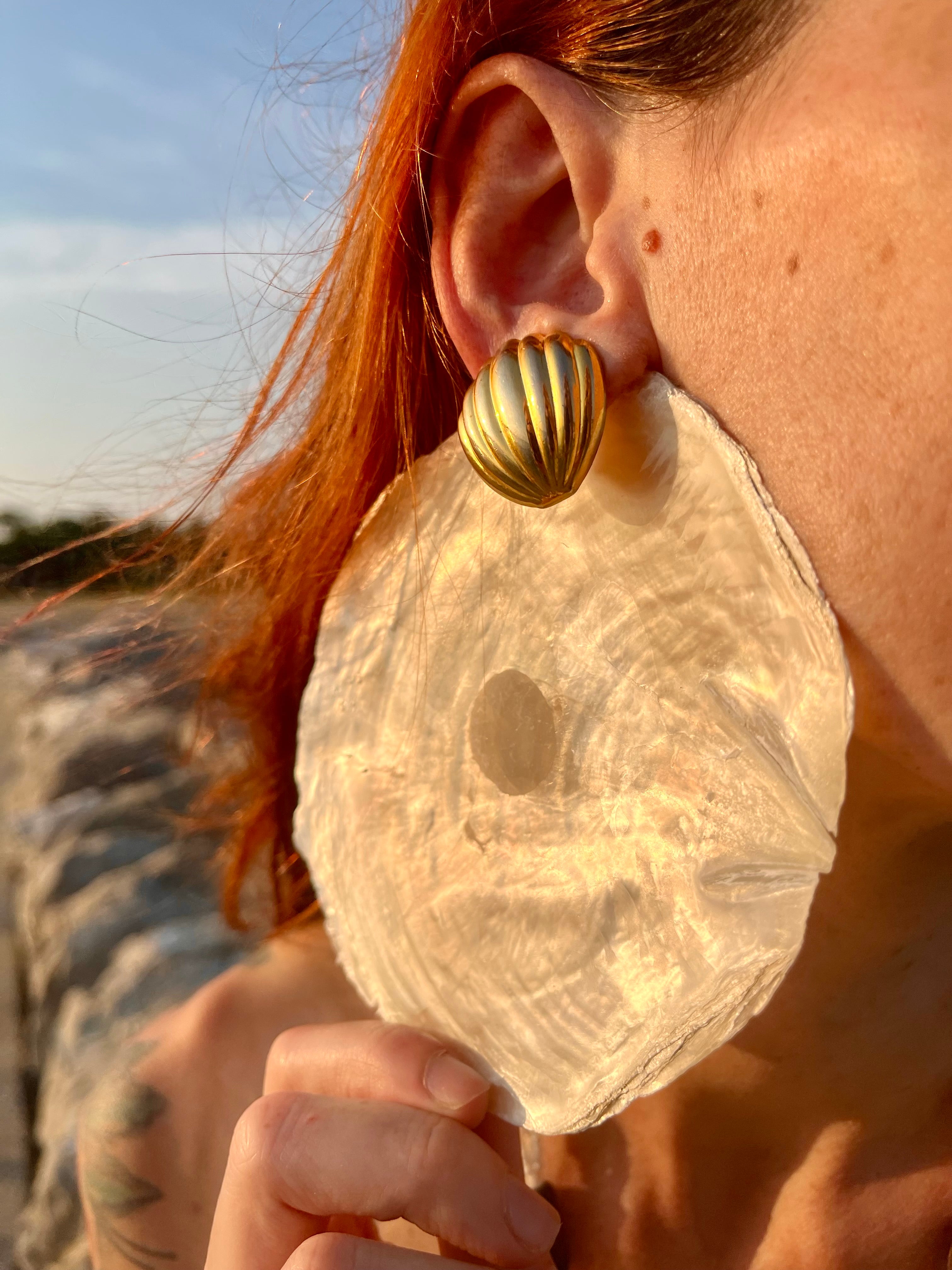 Malfi orecchini a clip a conchiglia