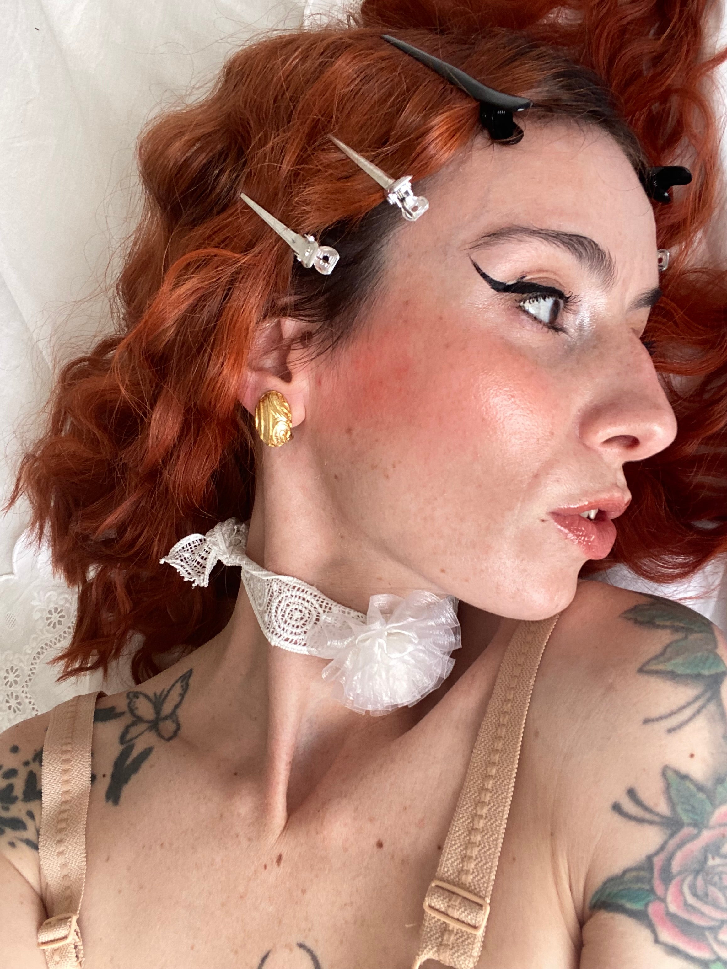 Orecchini a clip a bottone