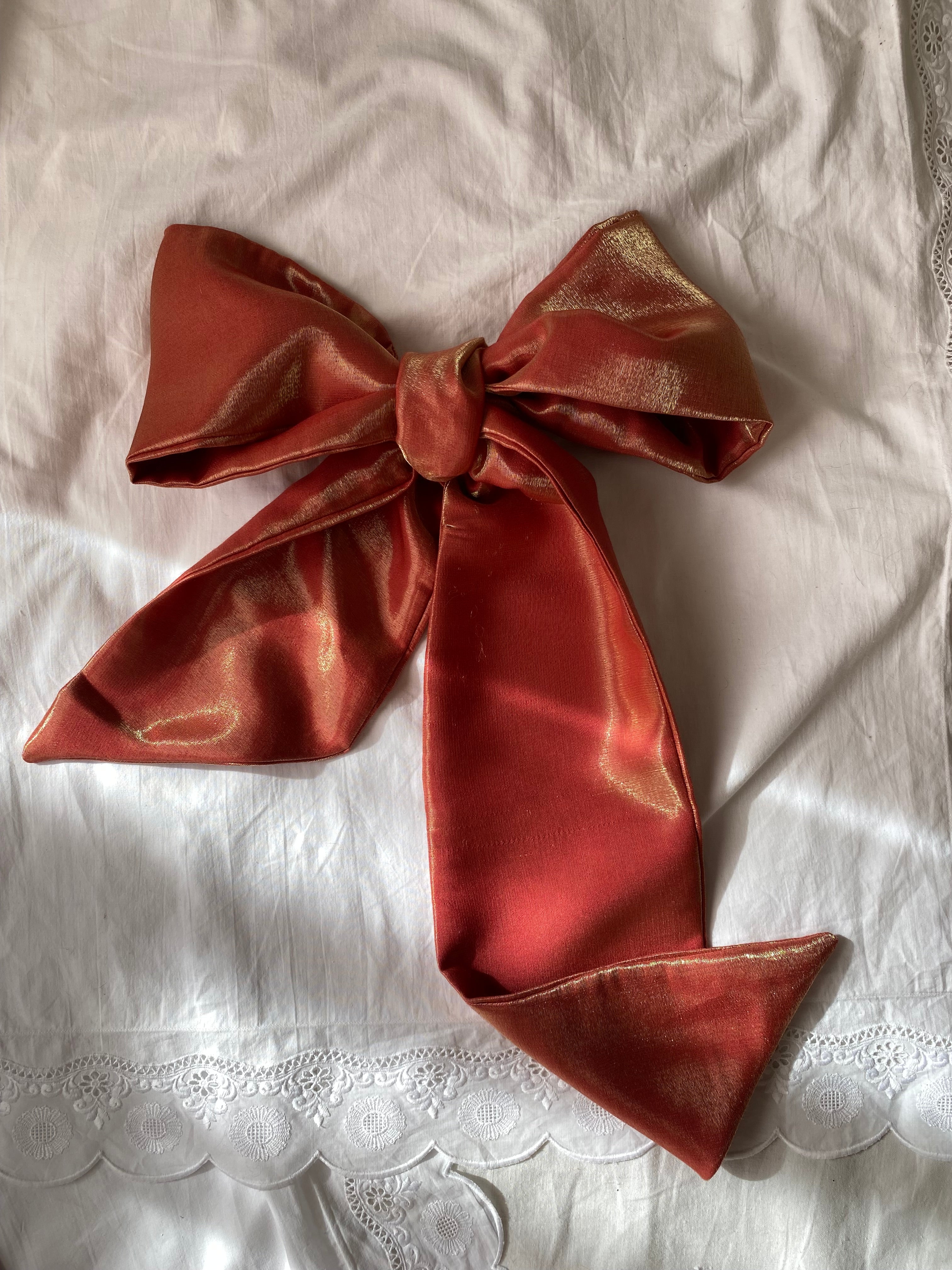 Fiocco sartoriale corallo