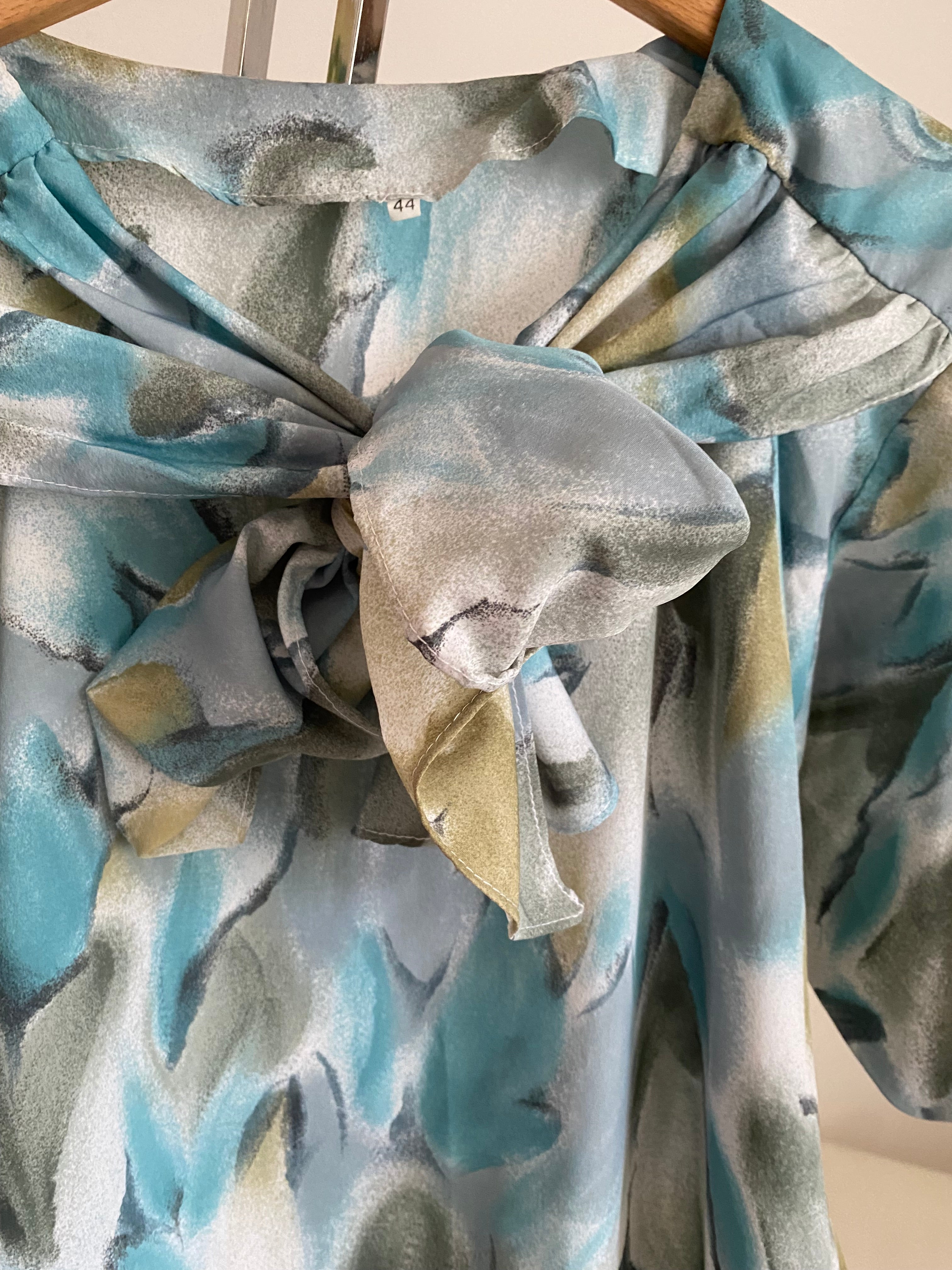 Abito floreale con maxi fiocco