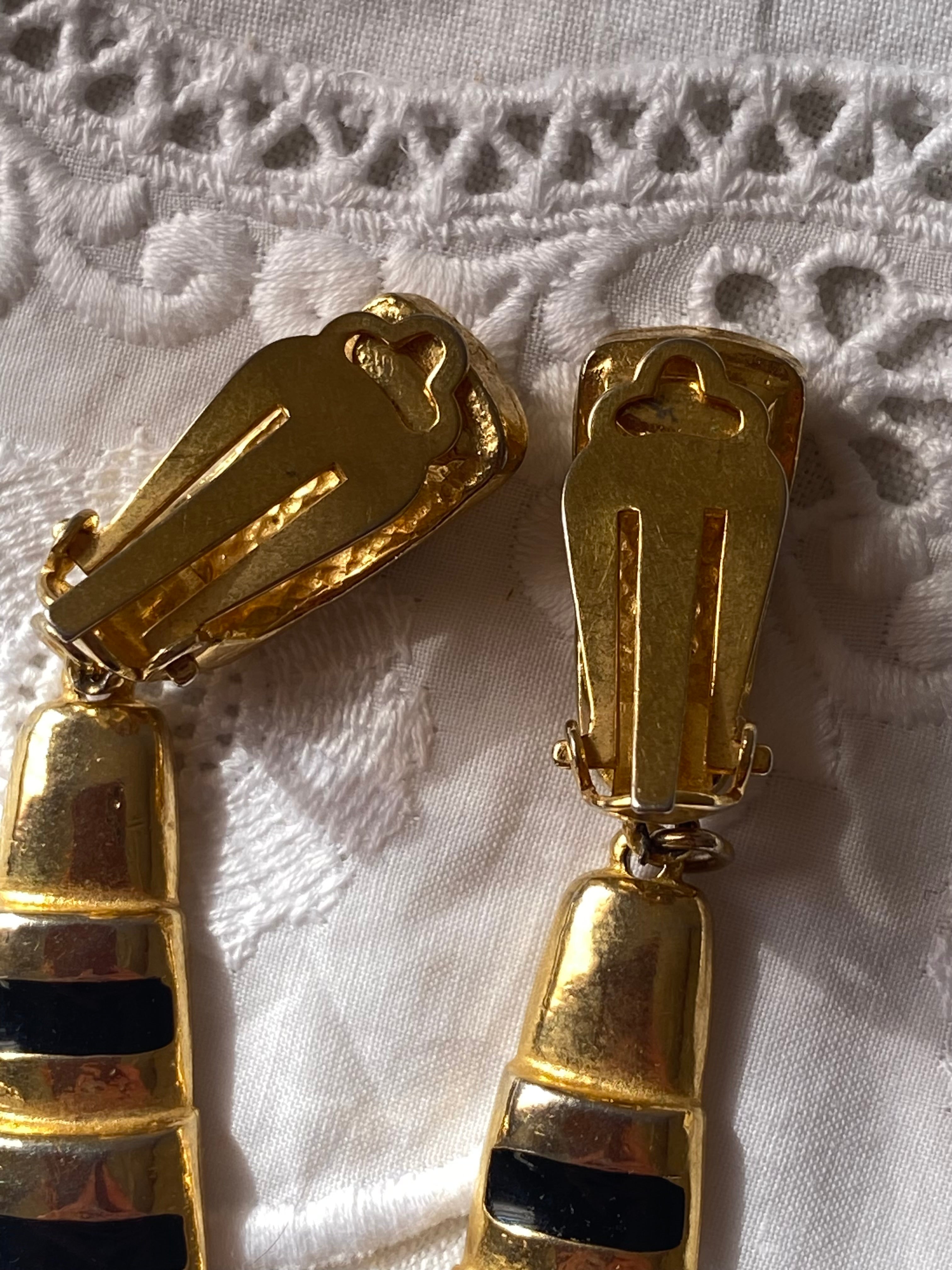 Orecchini i clip pendenti