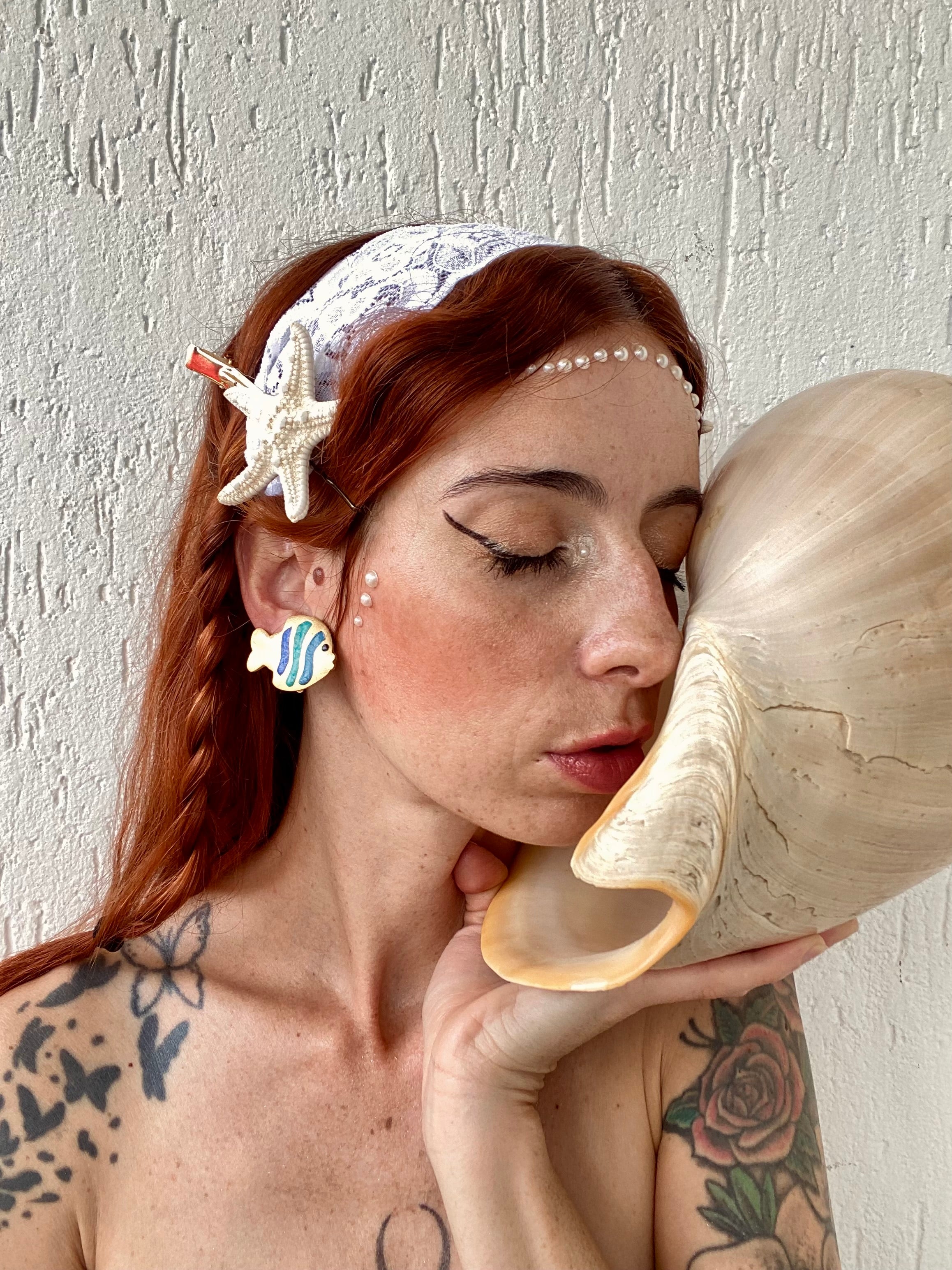 Orecchini pesce a clip by Agatha Paris