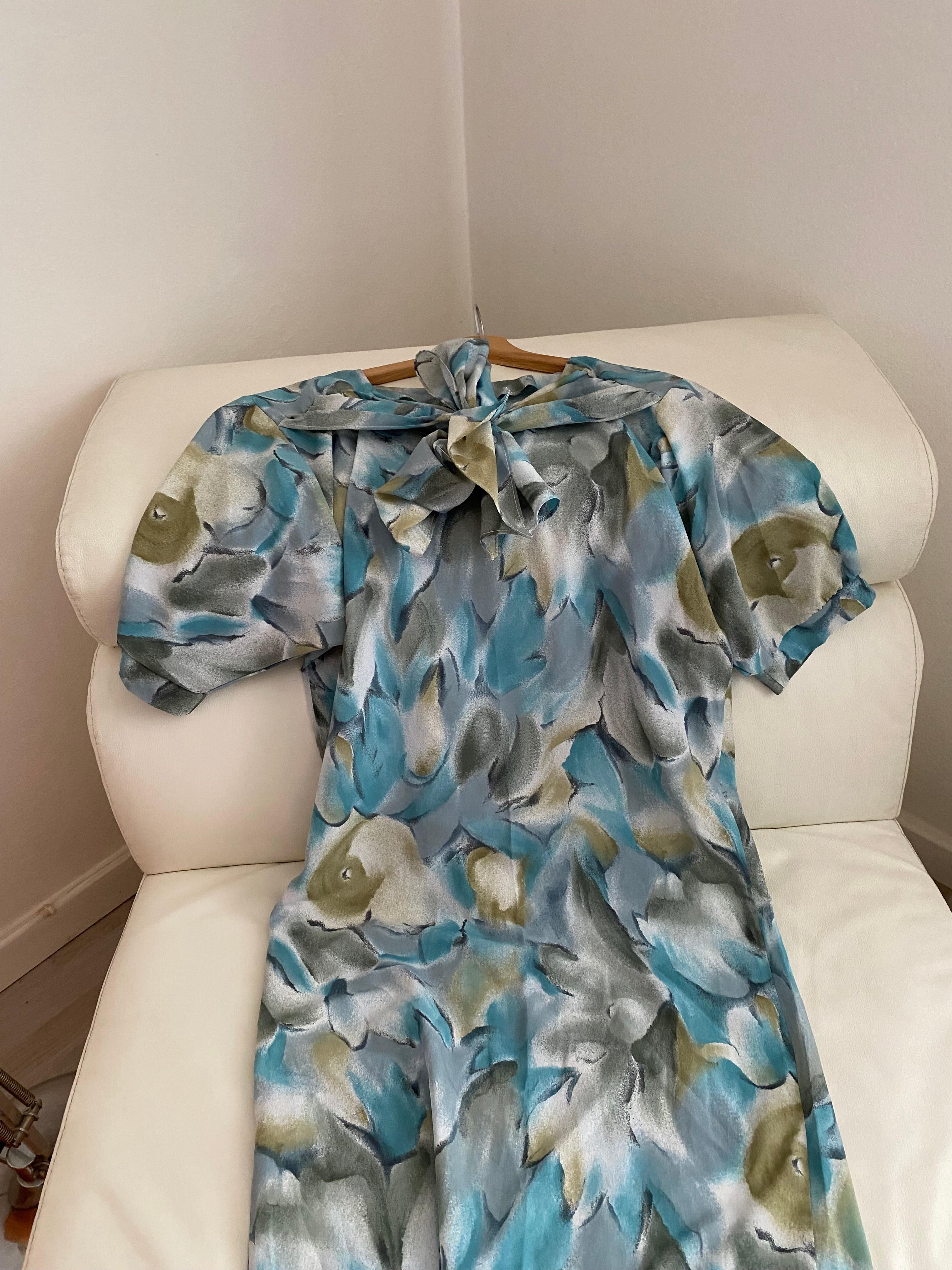 Abito floreale con maxi fiocco