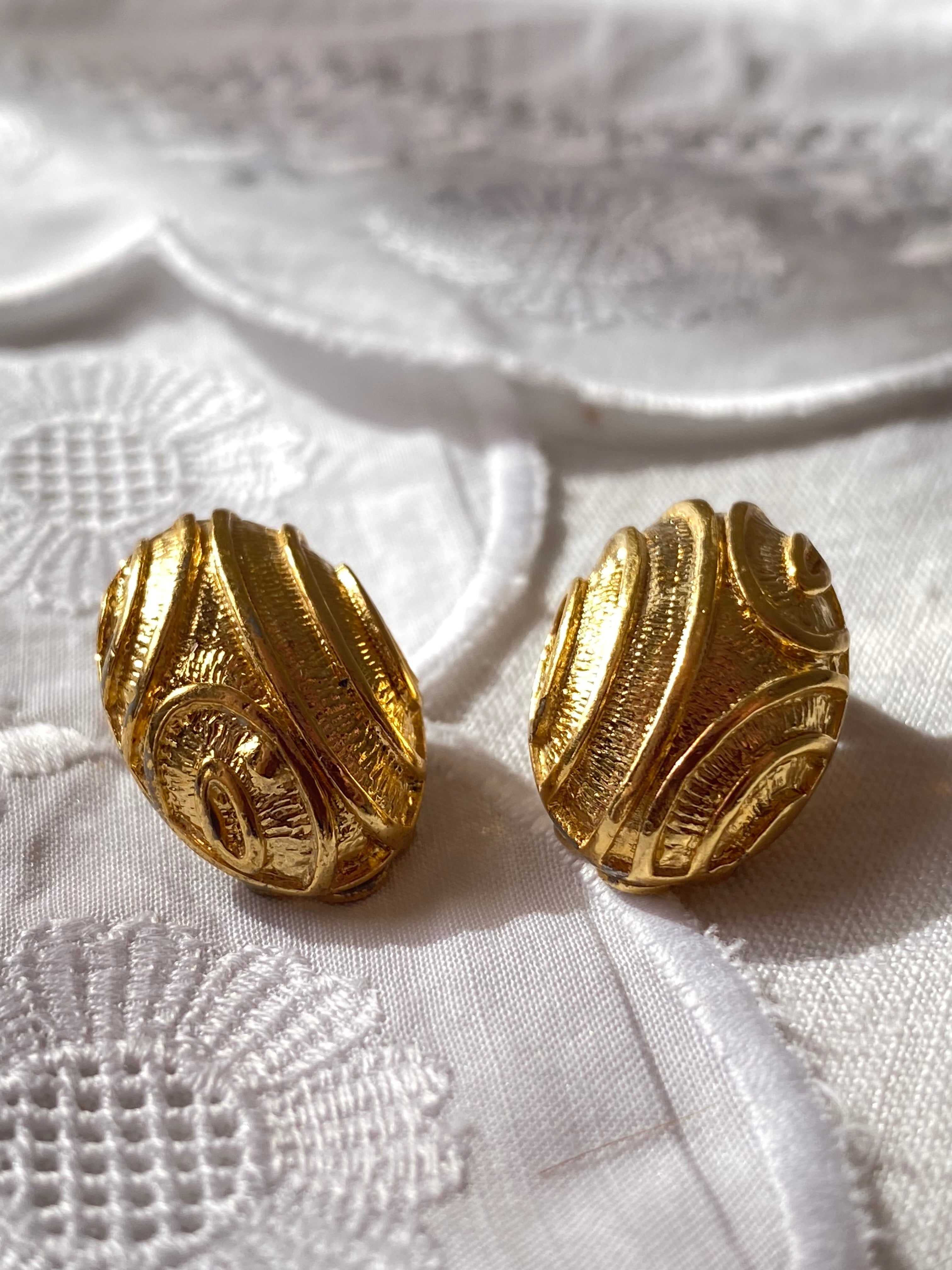 Orecchini a clip a bottone