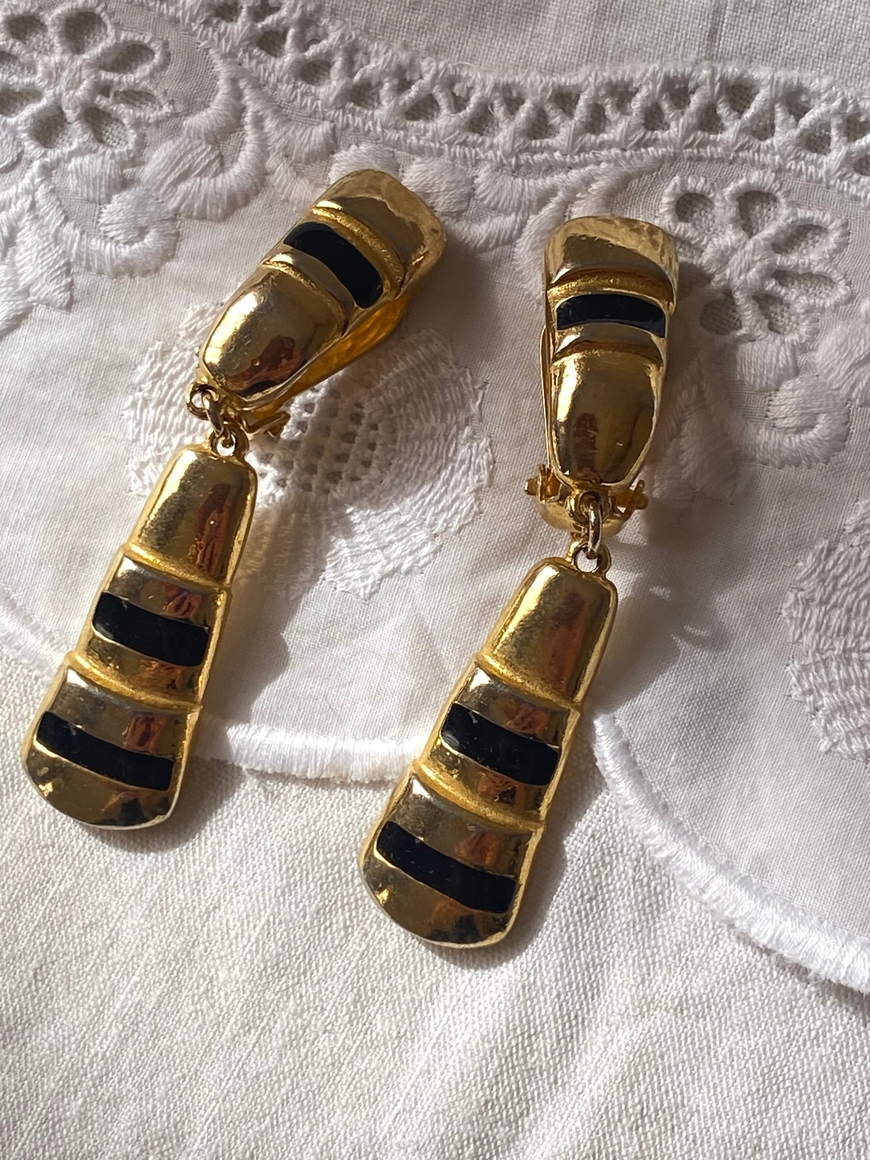 Orecchini i clip pendenti