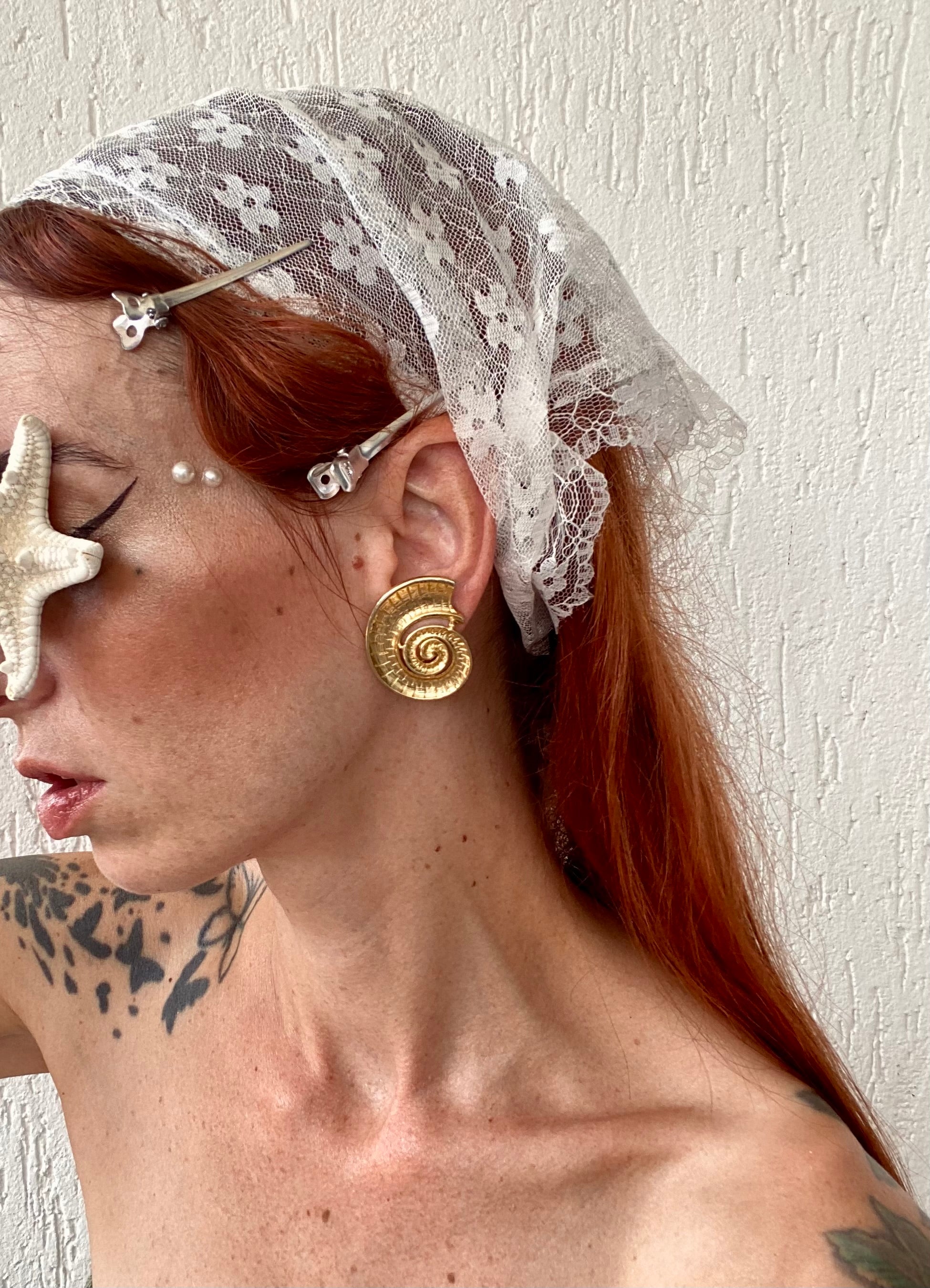 Ammonite orecchini a clip a conchiglia