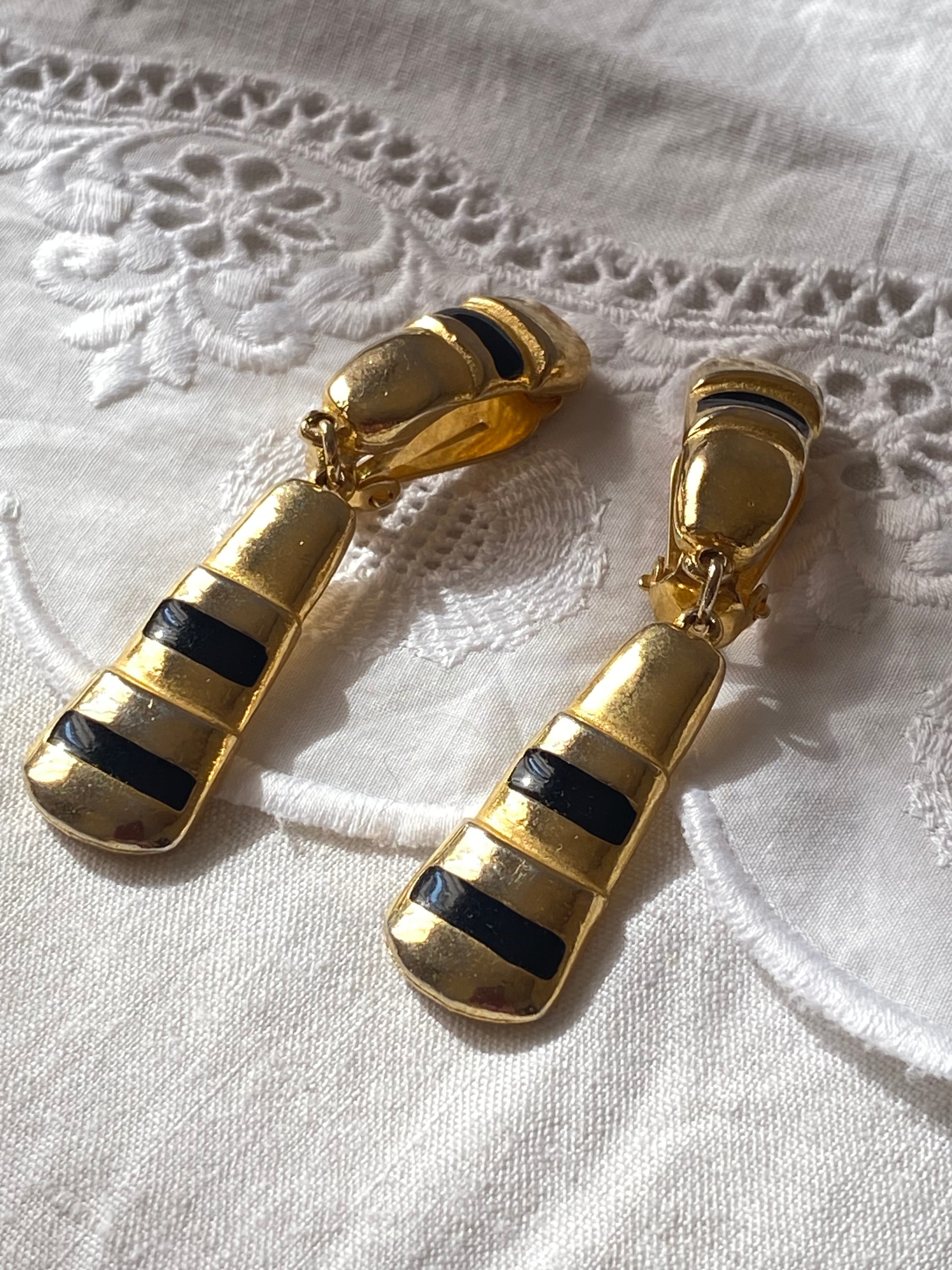 Orecchini i clip pendenti