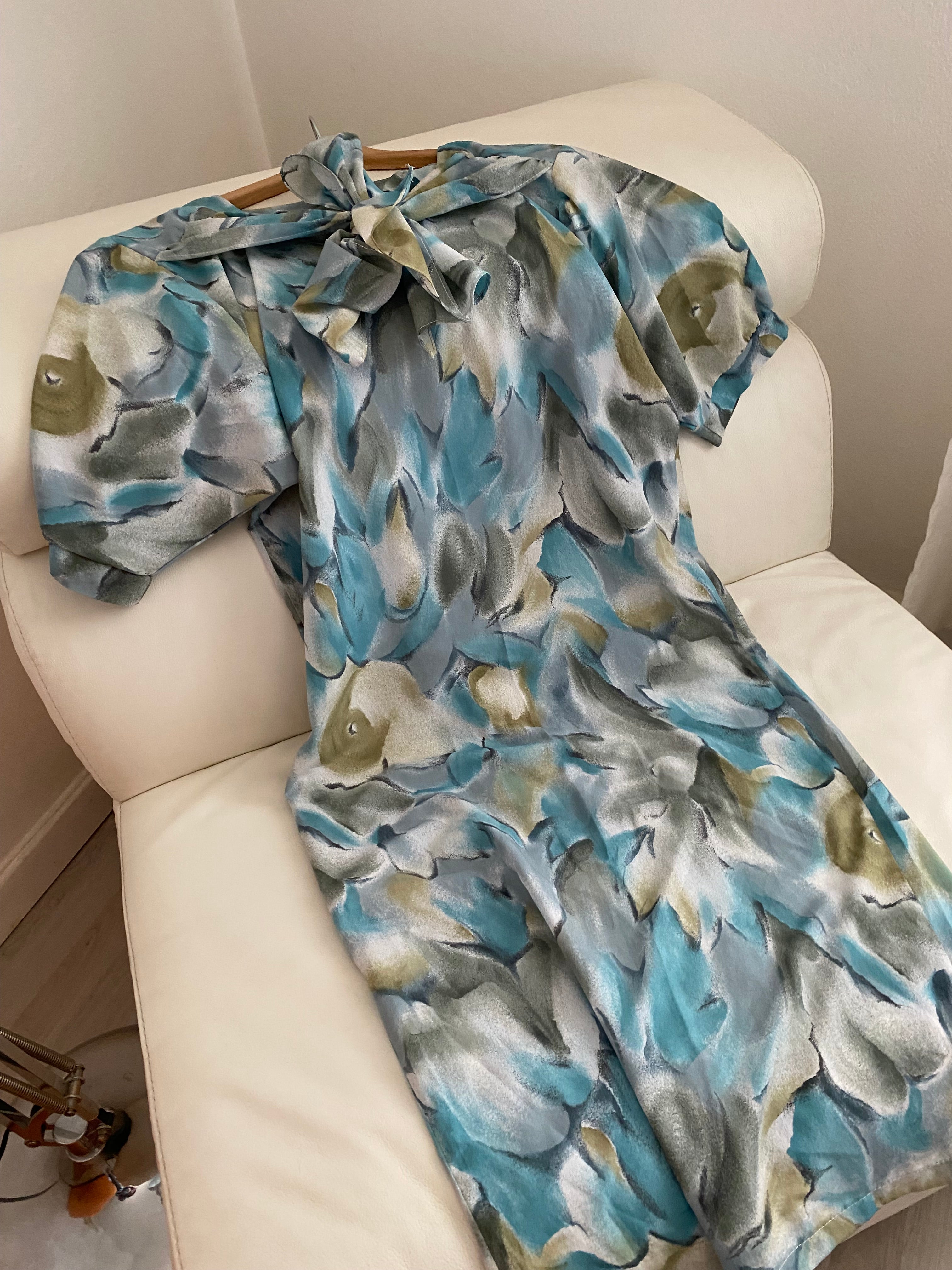 Abito floreale con maxi fiocco