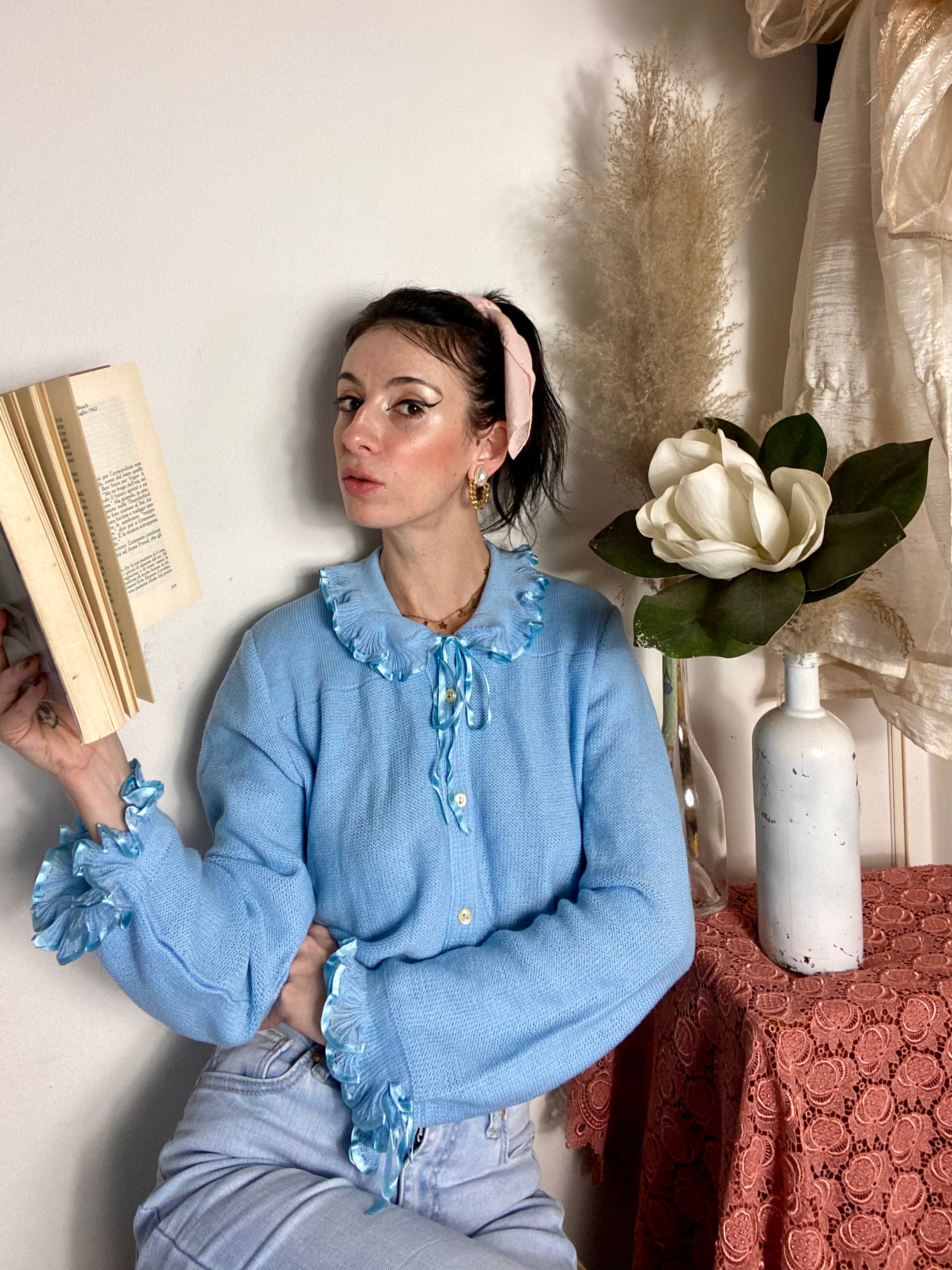 Pastel cardigan with ruffled collar and cuffs