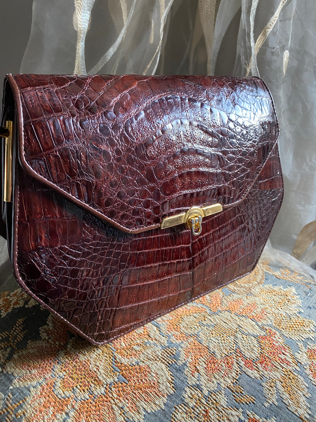 Pochette en crocodile losange