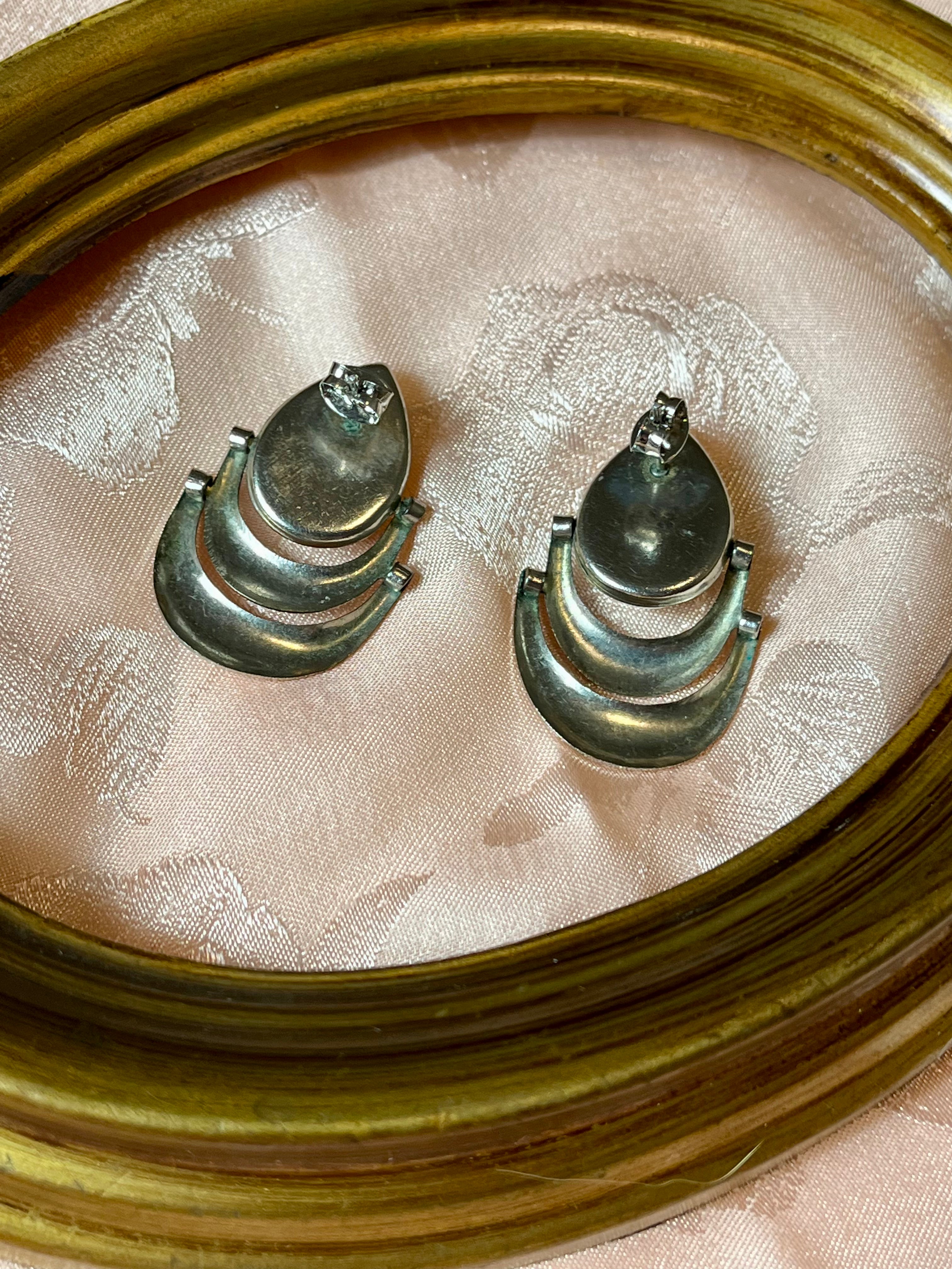 Orecchini argentati con perla