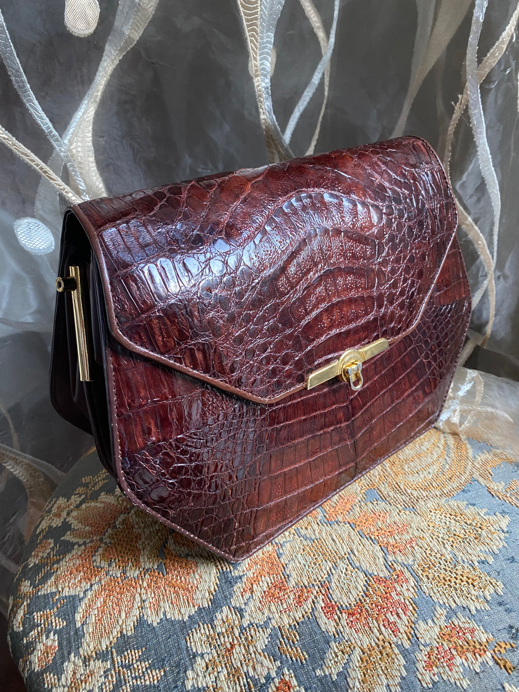 Pochette en crocodile losange