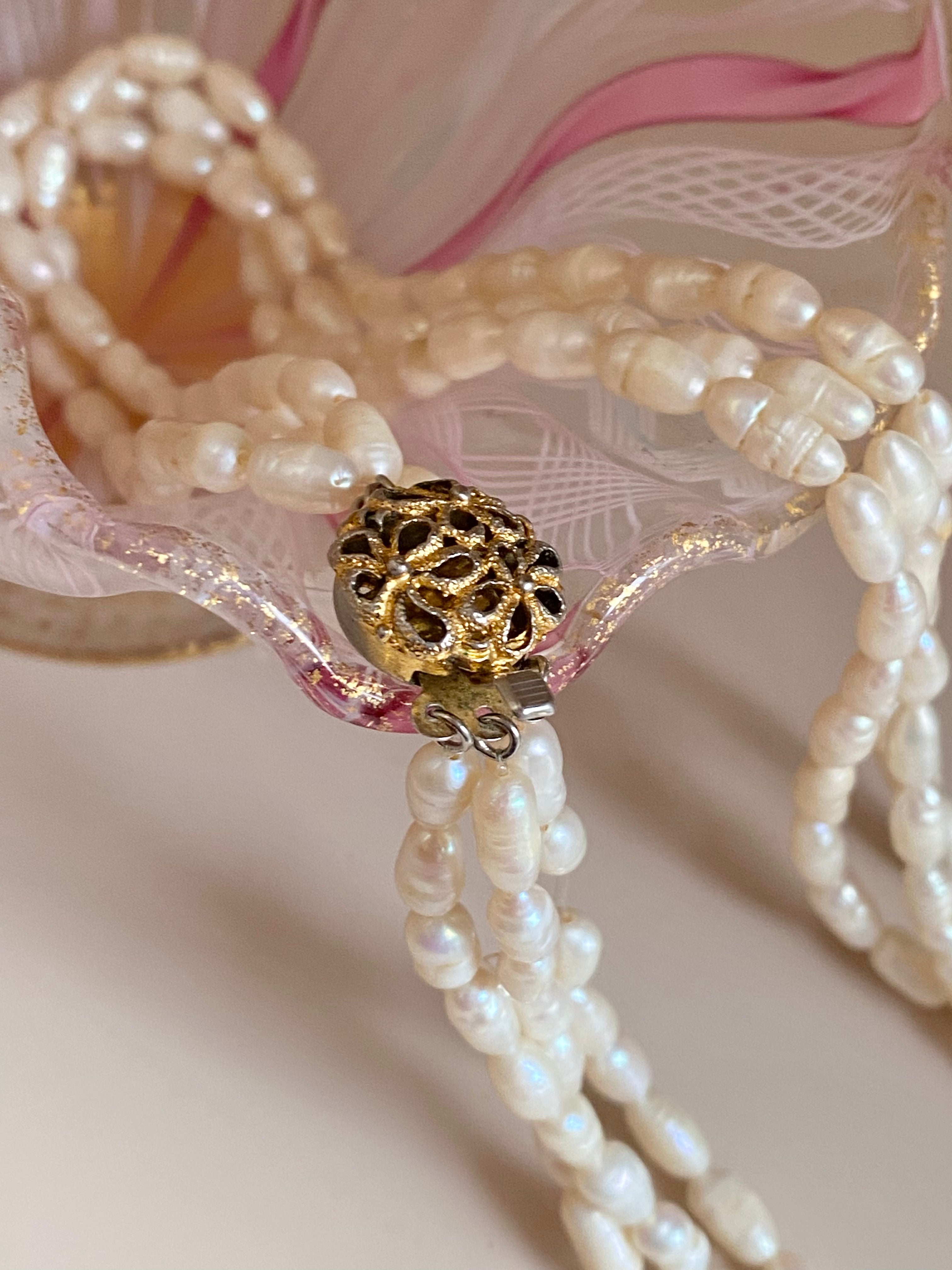 Collana in perle tre fili con chiusura in oro