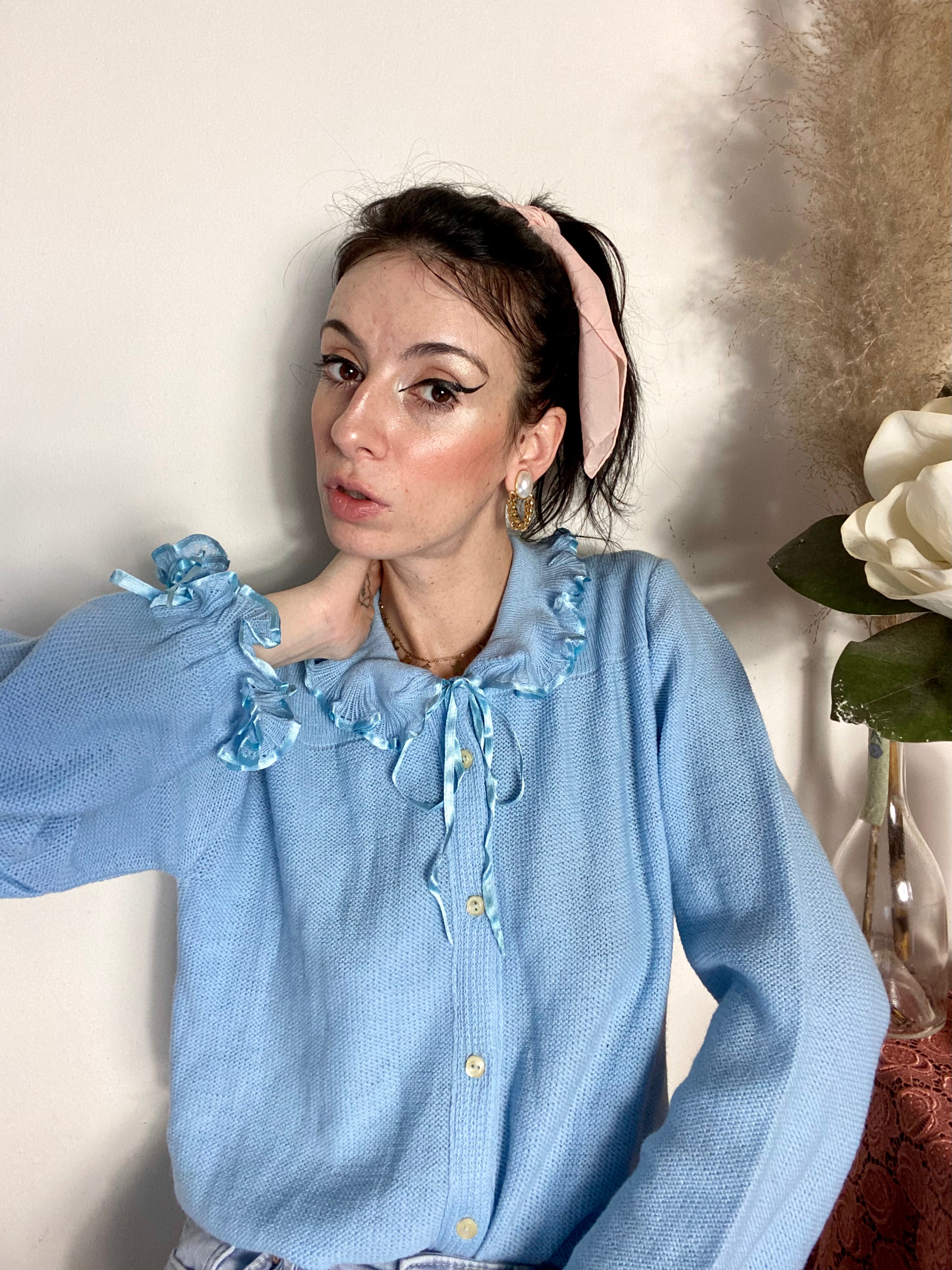 Pastel cardigan with ruffled collar and cuffs