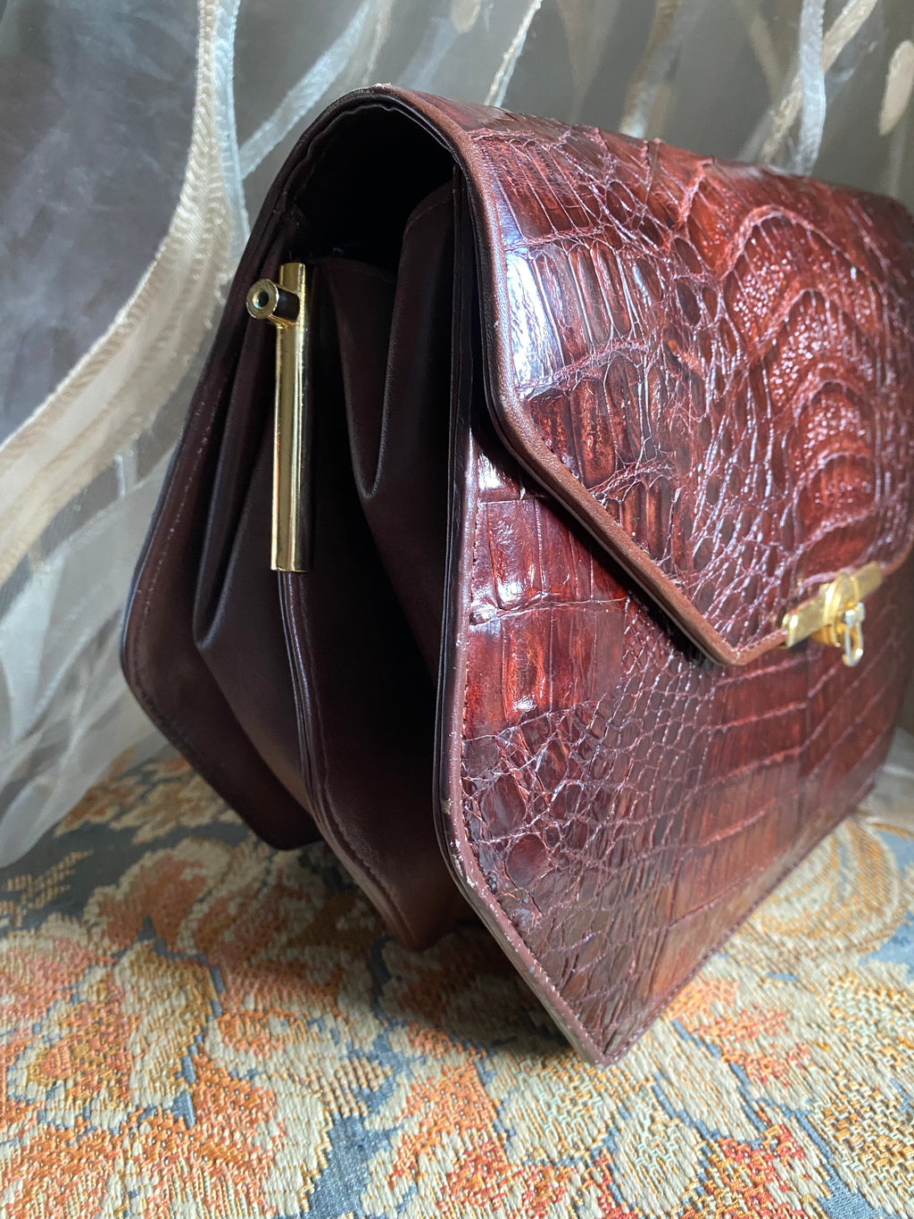 Pochette en crocodile losange