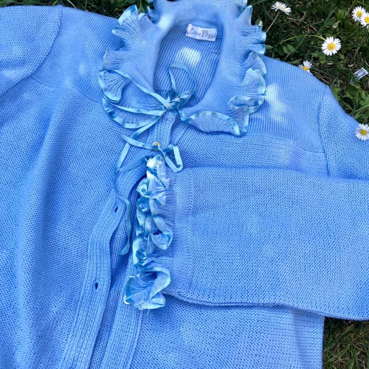 Pastel cardigan with ruffled collar and cuffs