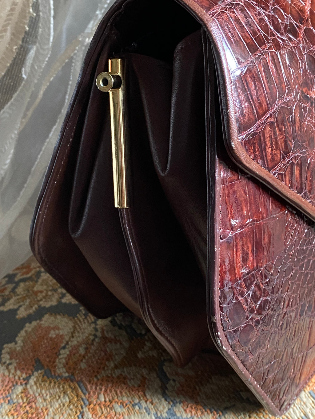 Pochette en crocodile losange