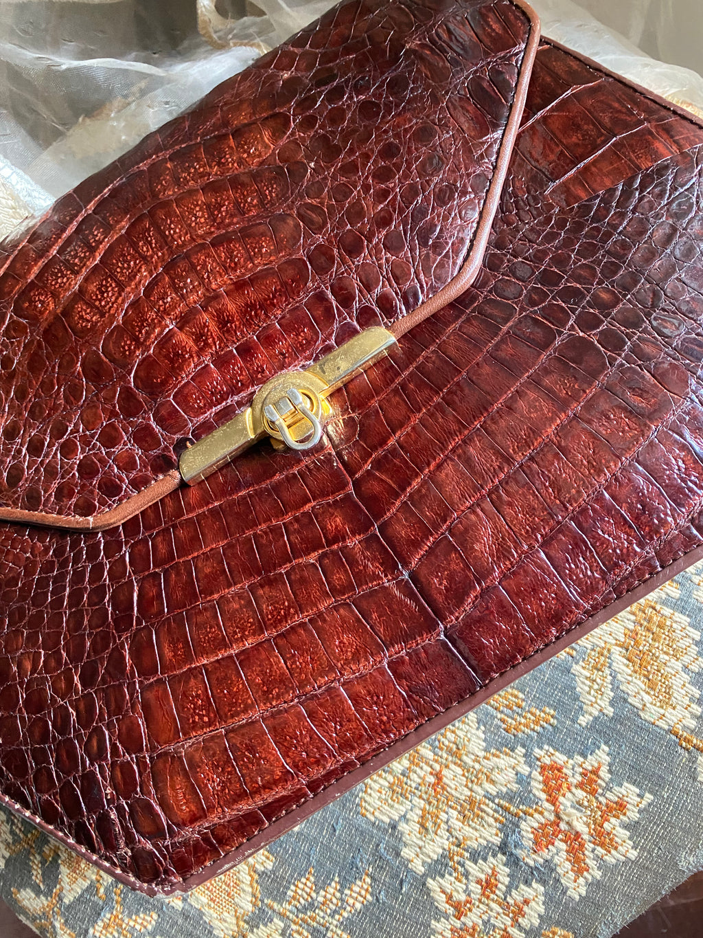 Pochette en crocodile losange